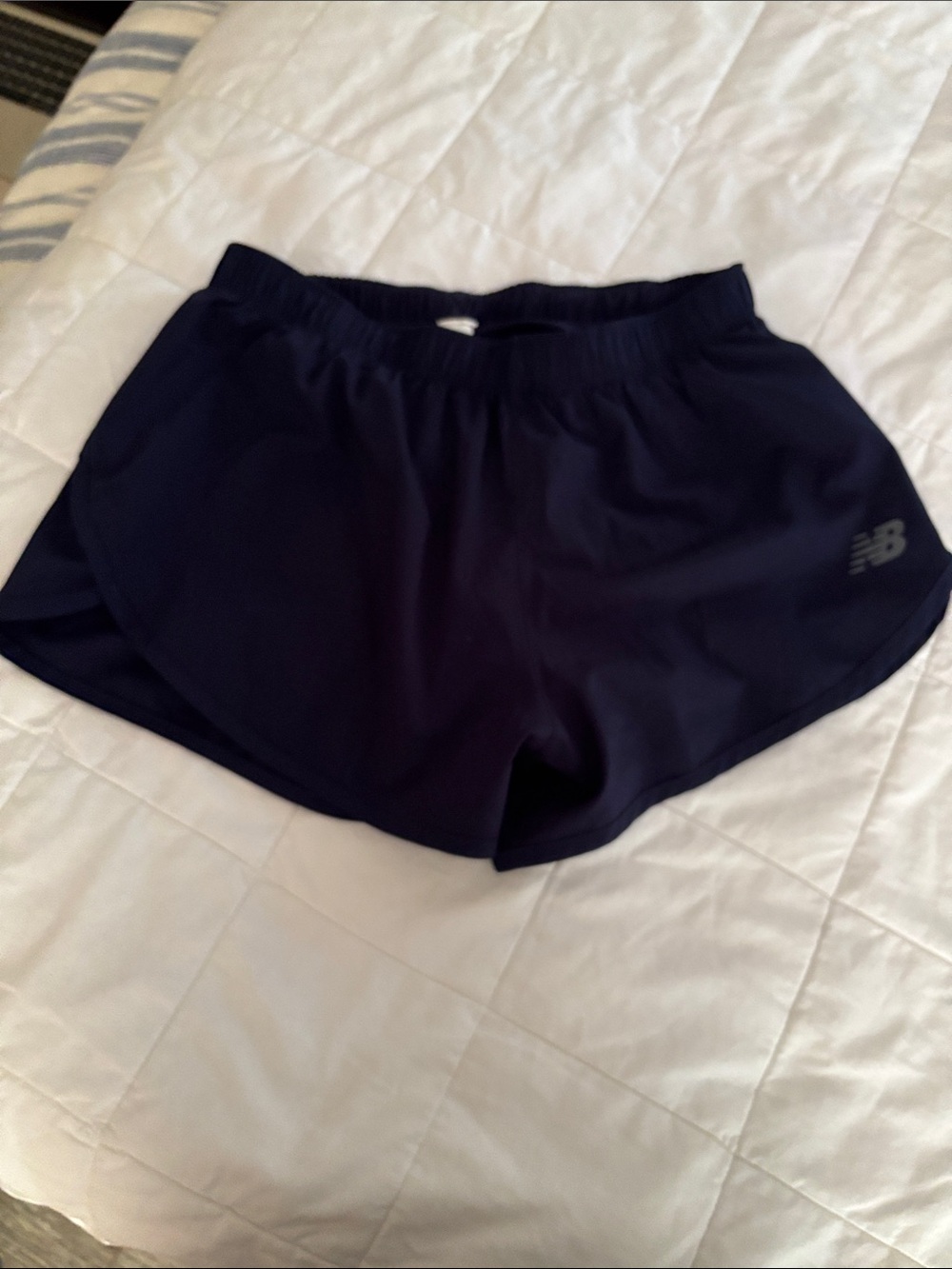 New Balance Women's navy Running Shorts Sz small built in shorts underneath